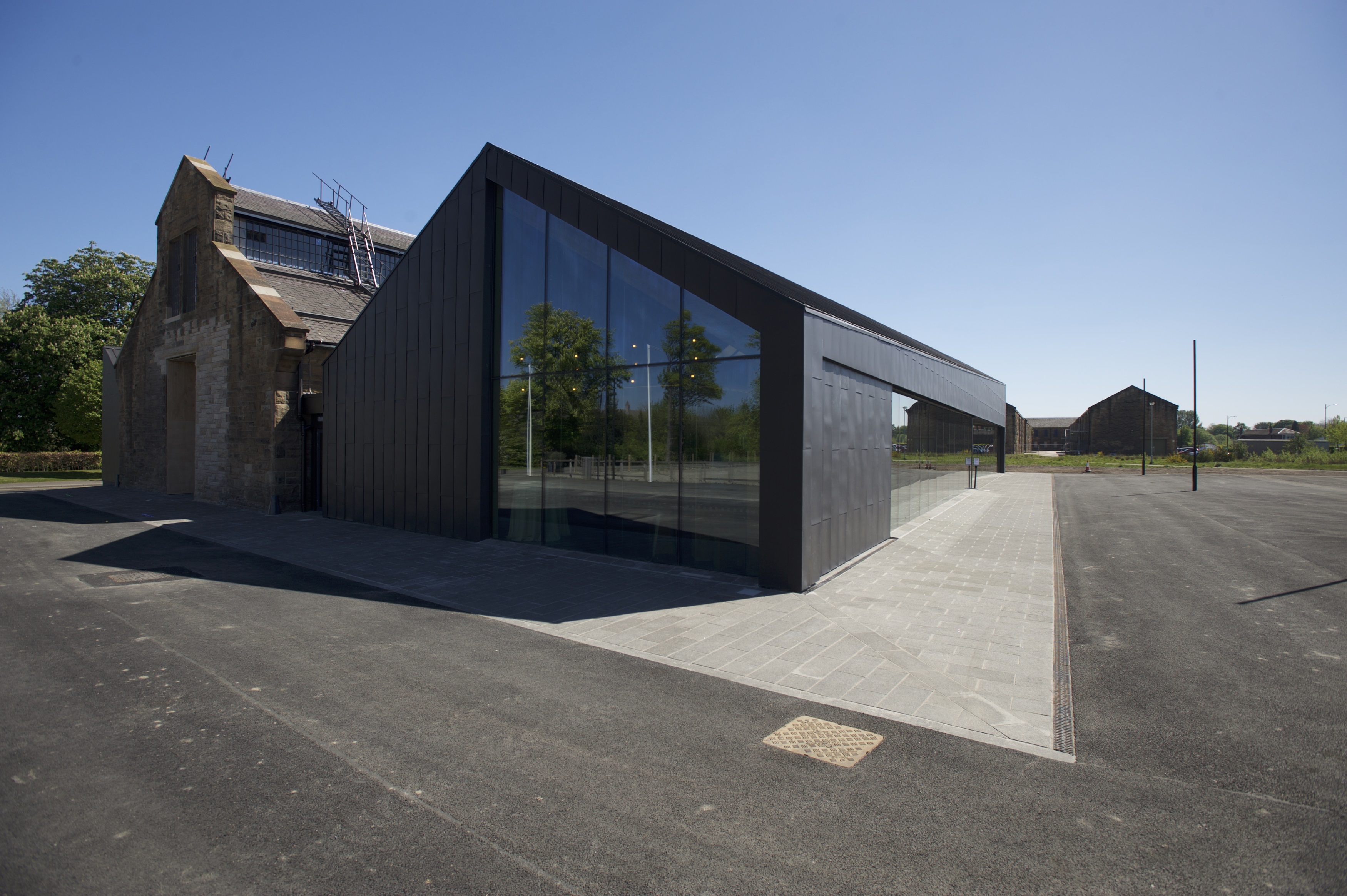 A modern facility built with traditional techniques and recycled elements A modern facility built with traditional techniques and recycled elements